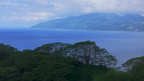 Big Tahiti Island vista point Taiarapu Matiti Taravao village barrier coral reef South Pacific Ocean French Polynesia aerial drone tropical jungle Mont Ronnie Orohena Papeete morning circle right