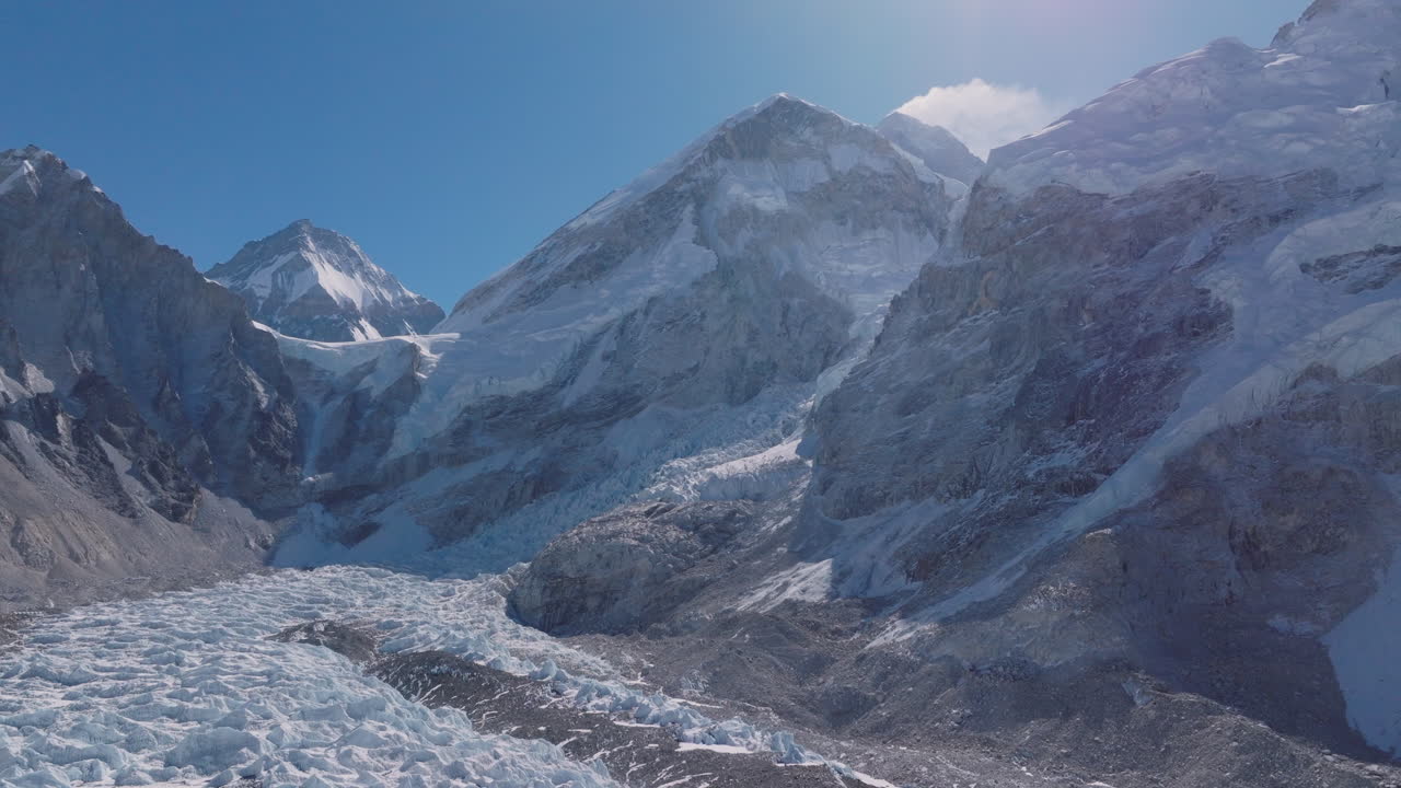 Drone shot of Everest Base Camp with snow peaks, summit start point, Khumbu glaciers, and stunning Nepal Himalaya scenery with sunlight shiny nature view
