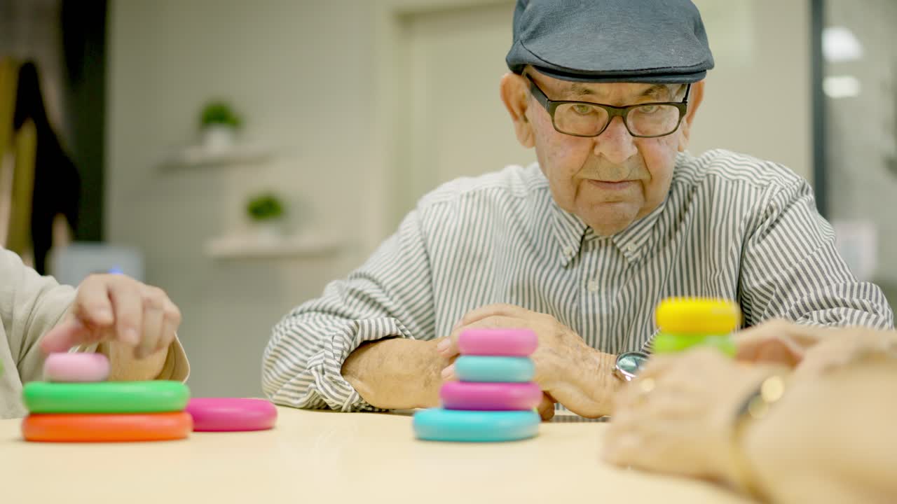 Elderly Man Engaging in Cognitive Activities