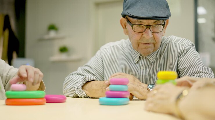 Elderly Man Engaging in Cognitive Activities