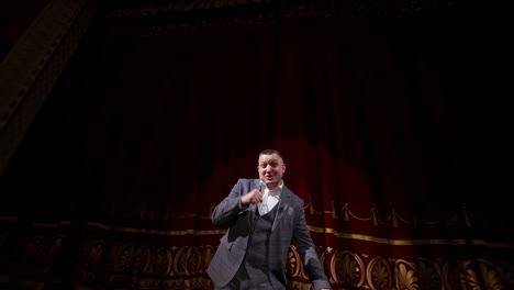 inspirational male speaker does presentation of new technological product. motivational speaker.