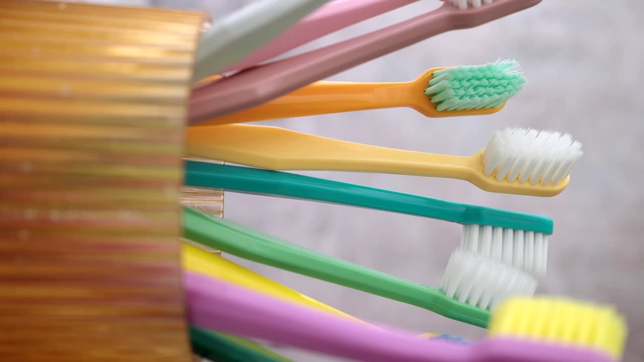 A collection of colorful toothbrushes