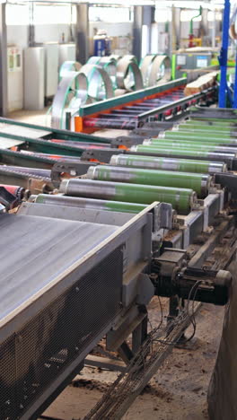 wooden boards after sawing at the sawmill. logging industry. special technik closeup. wood based industry department. vertical video