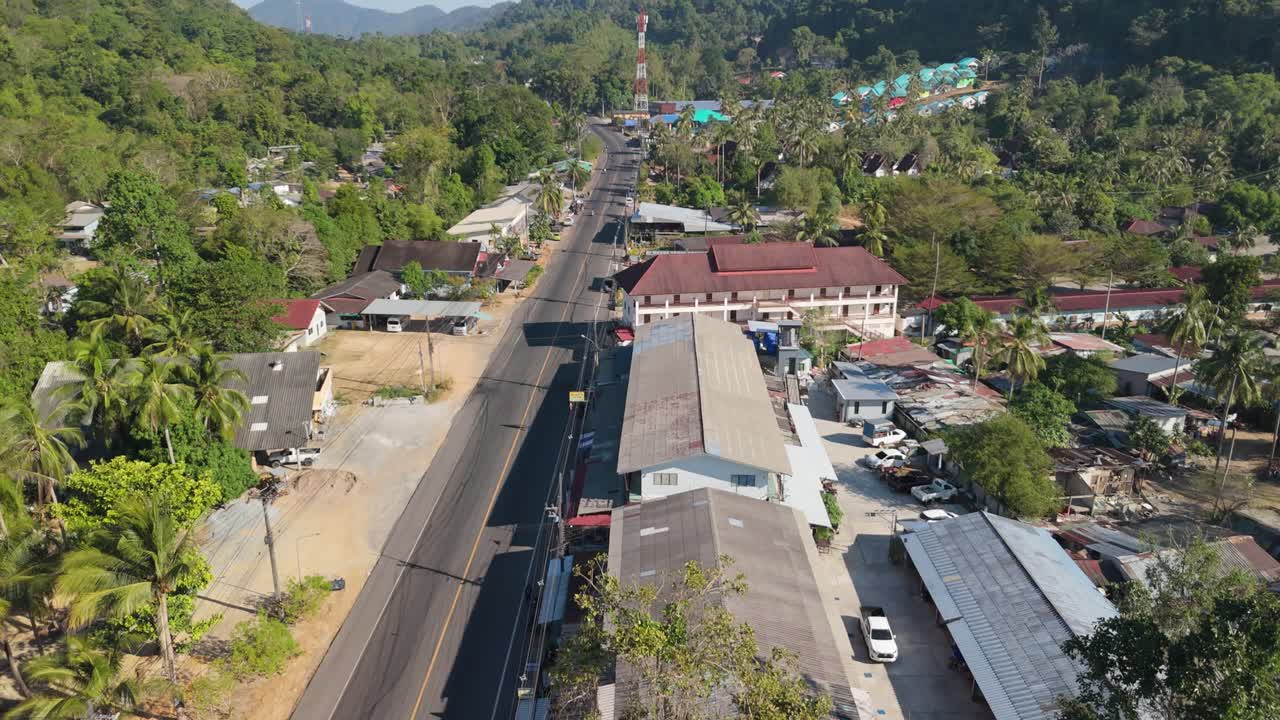 Overhead descending Drone Shot of Chia Chet Tourist Area, Koh Chang, with main roads and buildings