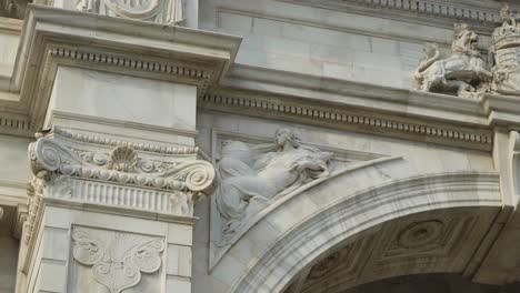 close-up of an ornate stone carving on an arch