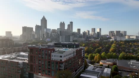 aerial in autumn pushing in to the atlanta georgia skyline
