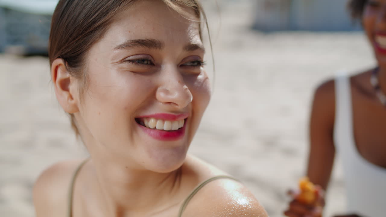 Closeup beautiful girl beach rest with lgbt partner. Happy couple relationship.