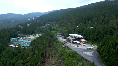 panorama of alishan transport station for alishan national forest recreation area in taiwan. aerial drone shot