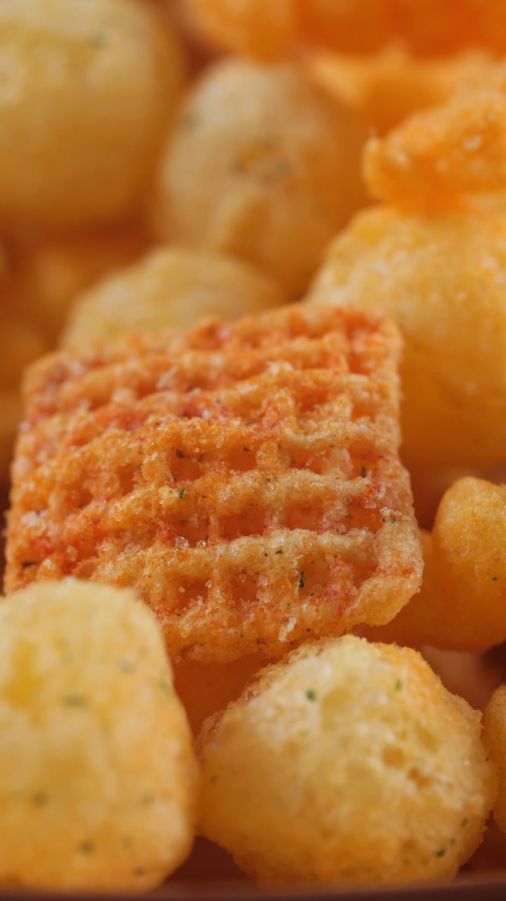 Close-up Macro Shot of Assorted Crunchy Savory Snacks