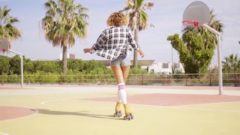 rear view of woman on roller skates