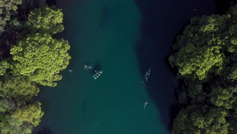 Aerial:-Lago-De-Camecuaro,-Boat,-Swimmer,-Tangancicuaro,-Mexico