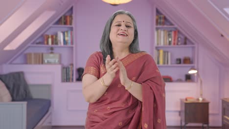 Happy-Indian-old-woman-clapping-and-appreciating