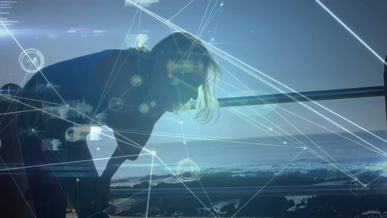 Exercising by ocean, person with digital network animation overlay in silhouette