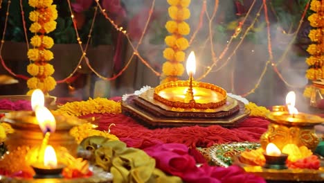 diwali decorations with candles and flowers