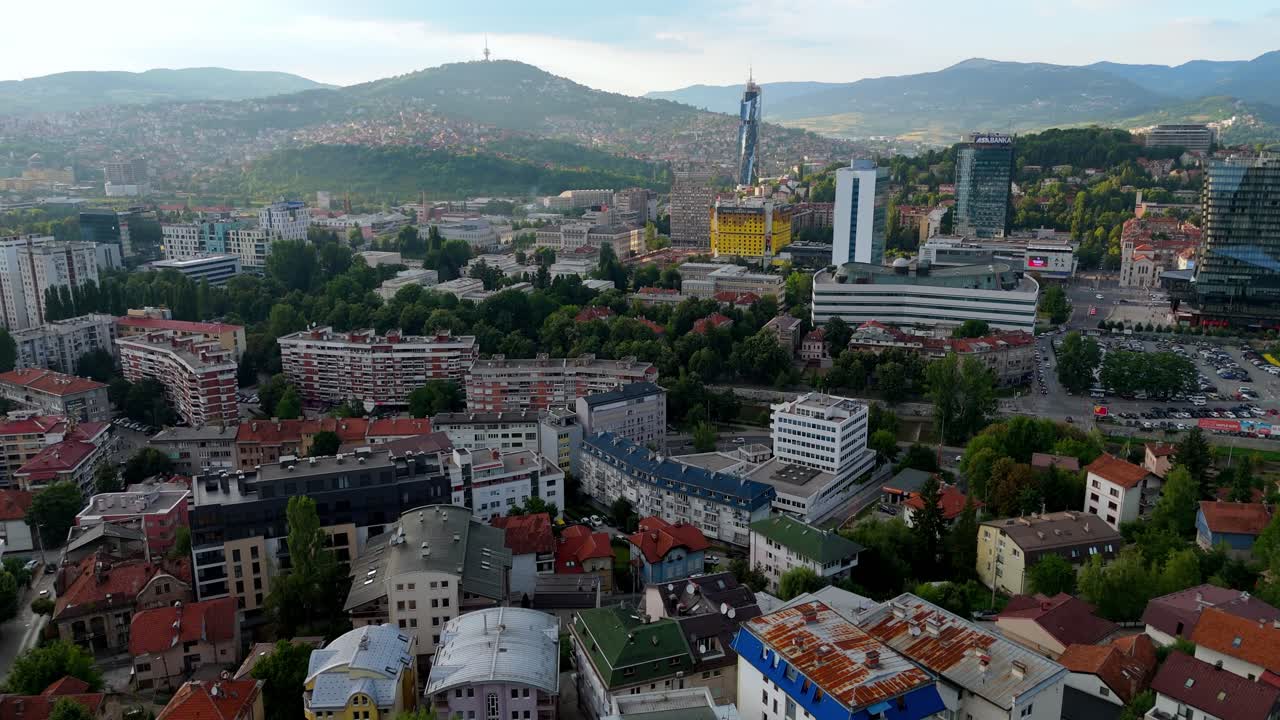 Aerial drone view of Sarajevo skyline, Bosnia and Herzegovina. Modern residential buildings city center downtown at sunset view from above