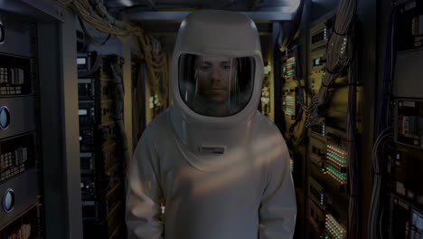 person in hazmat suit in a server room