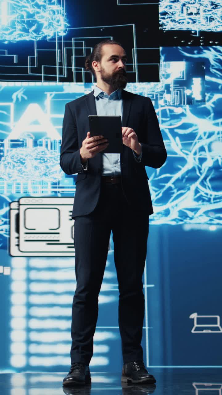 Vertical Video Tech savvy administrator reviewing AI brain programming on a tablet