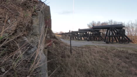 Multiple-canons-lined-up-at-an-old-norwegian-fortress