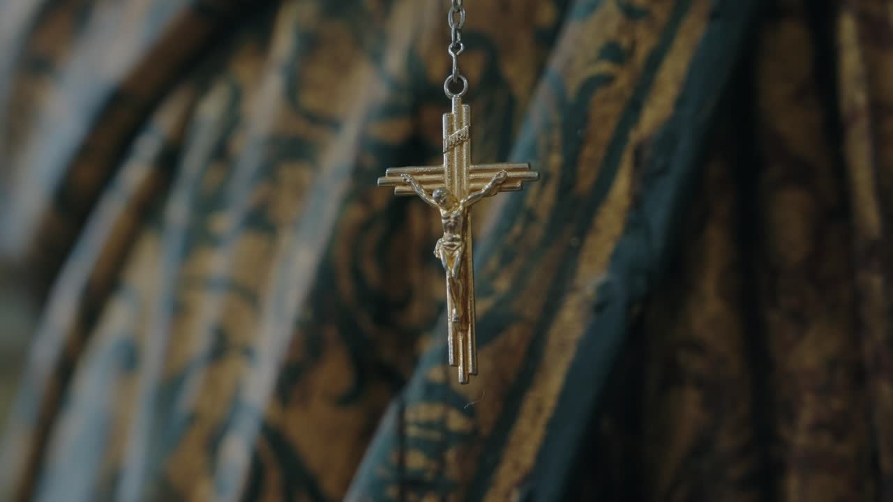 close view of golden crucifix suspended in quiet sacred atmospherer