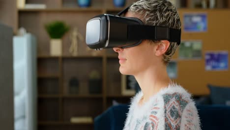 female executive wearing virtual reality headset in office 4k