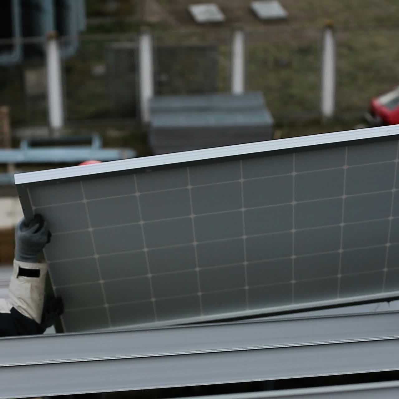 Solar panel technician on panels