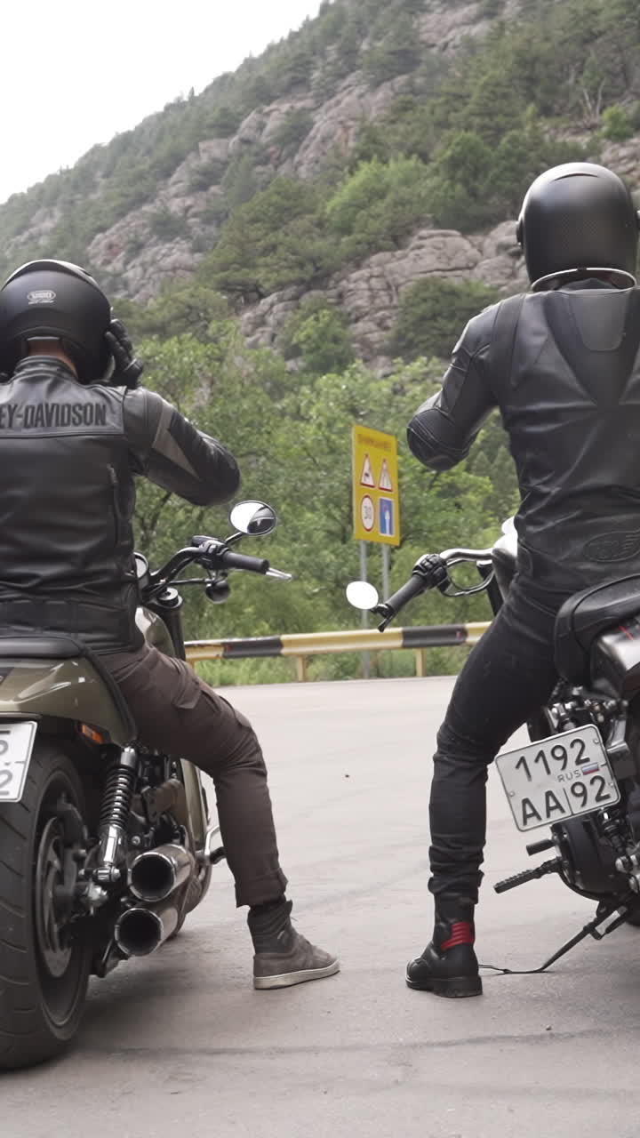 Two Bikers on a Scenic Mountain Road Trip