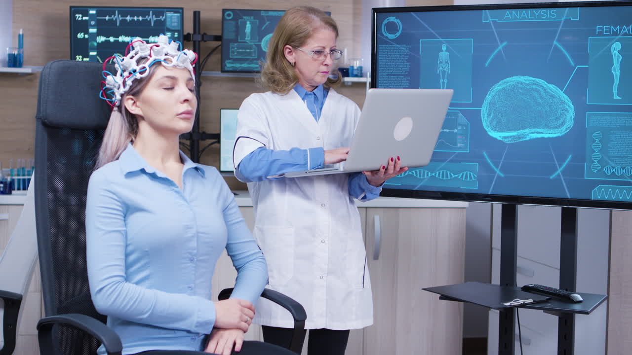 Female doctor in neuroscience checking brain data on her laptop
