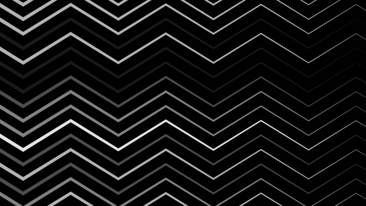 Animation of white and grey zigzag shapes moving over black background