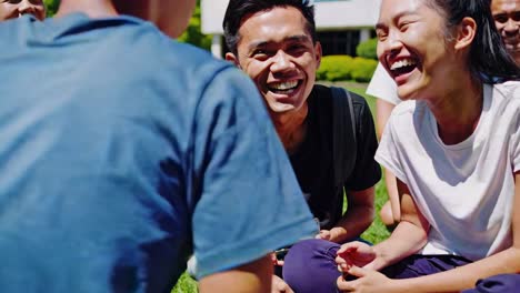 happy students socializing outdoors