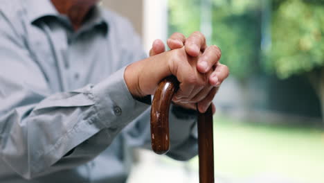 elderly man with walking cane