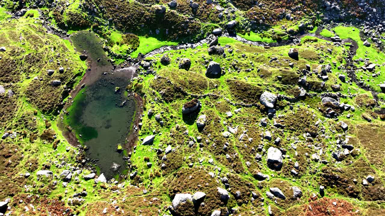 Looking down on small lake and stream in the Comeragh Mountains Ireland Epic Locations