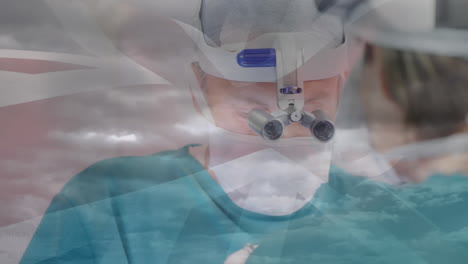 animación de la bandera del reino unido sobre los médicos durante la cirugía