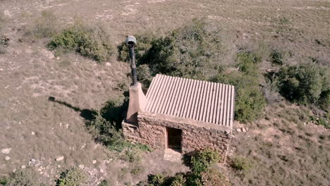 isolated abandoned farm house in mountains. -- mavic pro poi shot