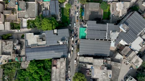 solar rooftops over gujranwala street, punjab, pakistan