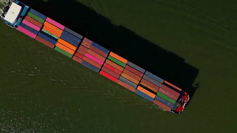 Cargo-ship-topview,-fully-loaded-with-coloured-containers