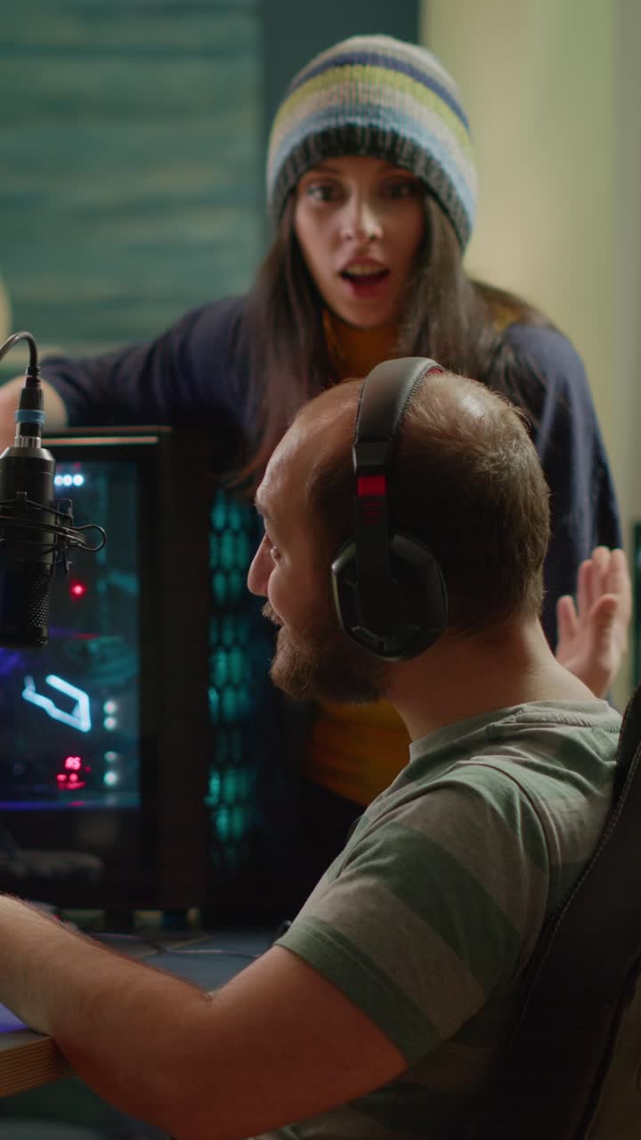 A man and a woman collaborating during an online gaming or streaming session