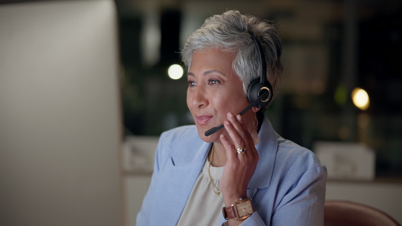 Business woman with headset in office