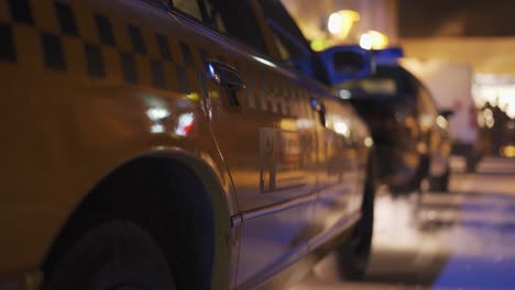 close up footage taxi stands at red traffic light and haze