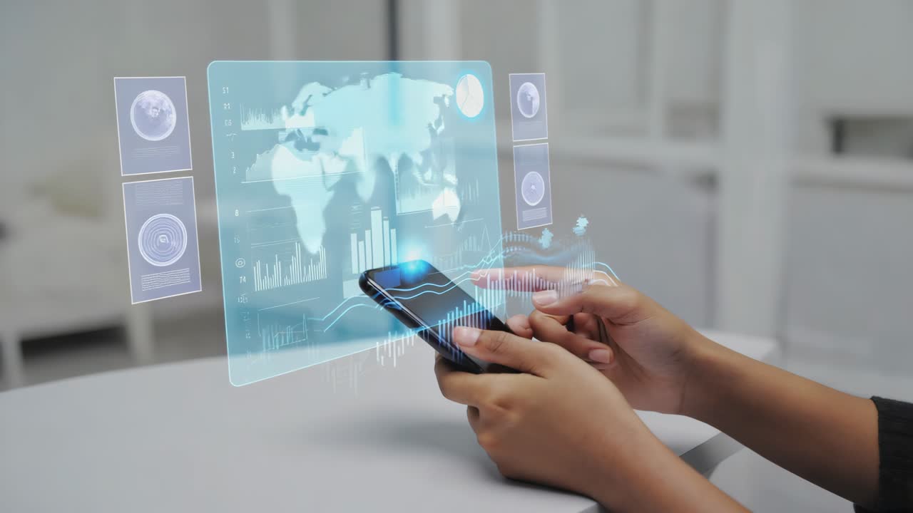 Person interacting with a holographic data display and smartphone