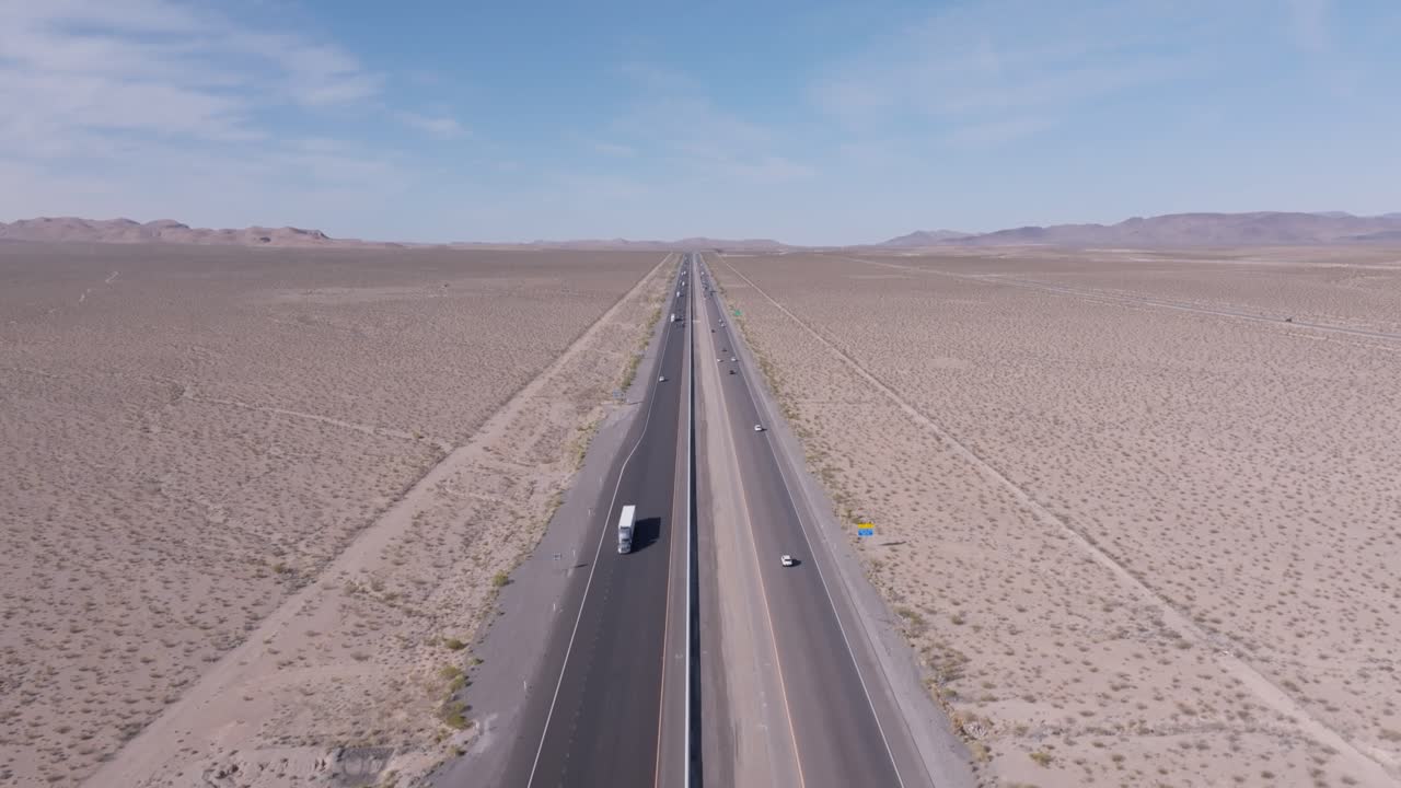 Birds Eye drone footage tracking up I-15 as the desert leads to Las Vegas.