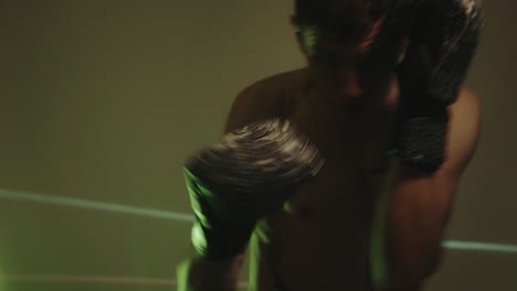 male boxer throwing punch - close up