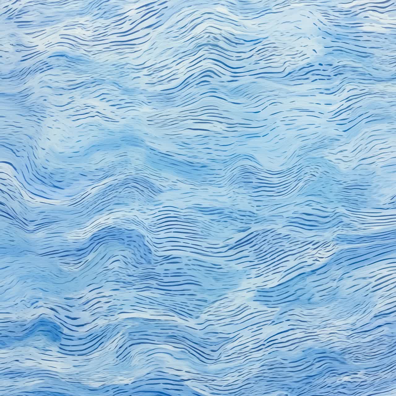 Top-down view of abstract blue waves pattern, resembling a serene ocean