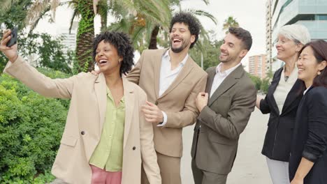 Group selfie of diverse business team