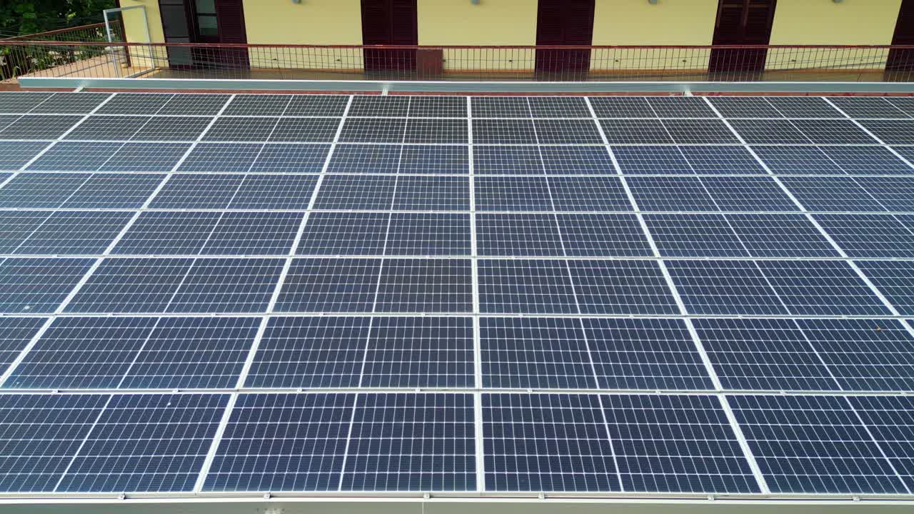 Flying over a solar panels roof in São Tomé,Africa