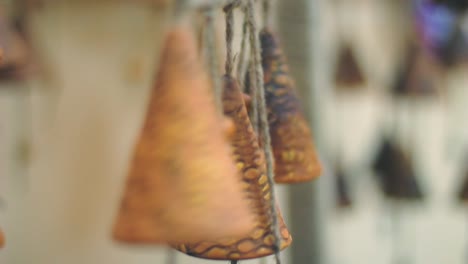 Feng-shui-chimes.-Wind-swinging-clay-bells-slowly.-Feng-shui-amulet