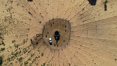 Aerial-view-of-a-wagon-wheel-grazing-system-with-a-central-watering-point-on-a-rural-farm,-South-Africa