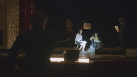 theater performance with a person in a wheelchair