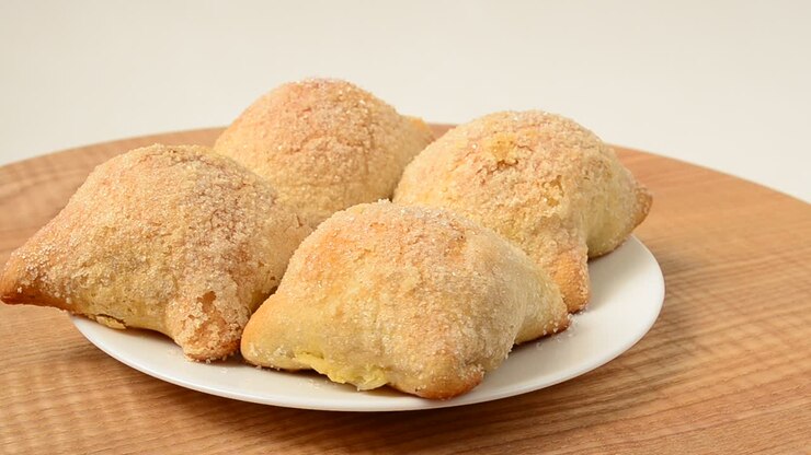 Pastries with apples. Shooting in the movement