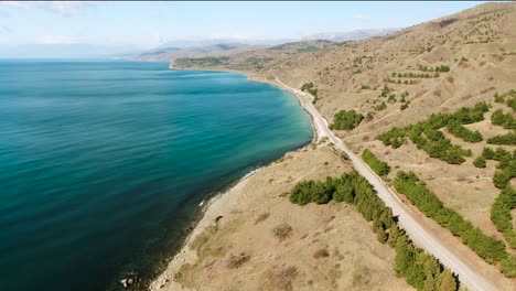 coastal road and mountains aerial view