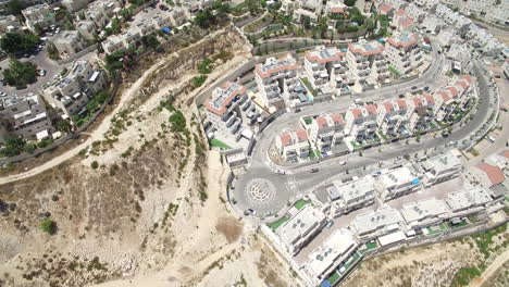 aerial view of a residential neighborhood in an arid landscape